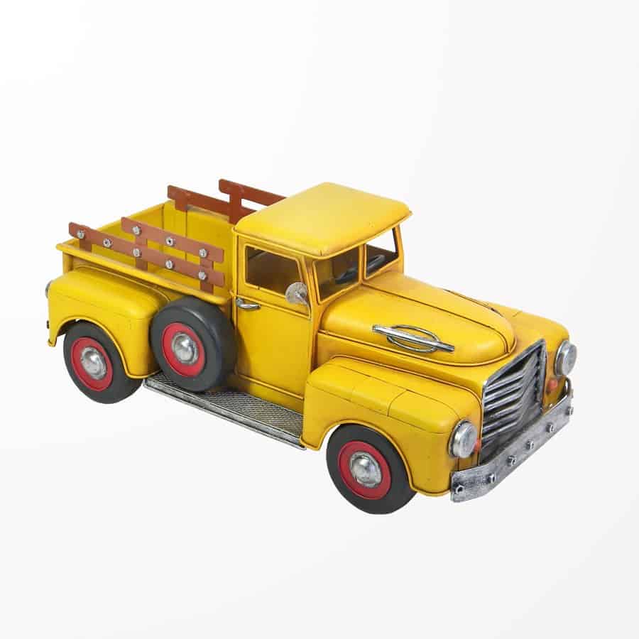 Camion jaune en métal vintage